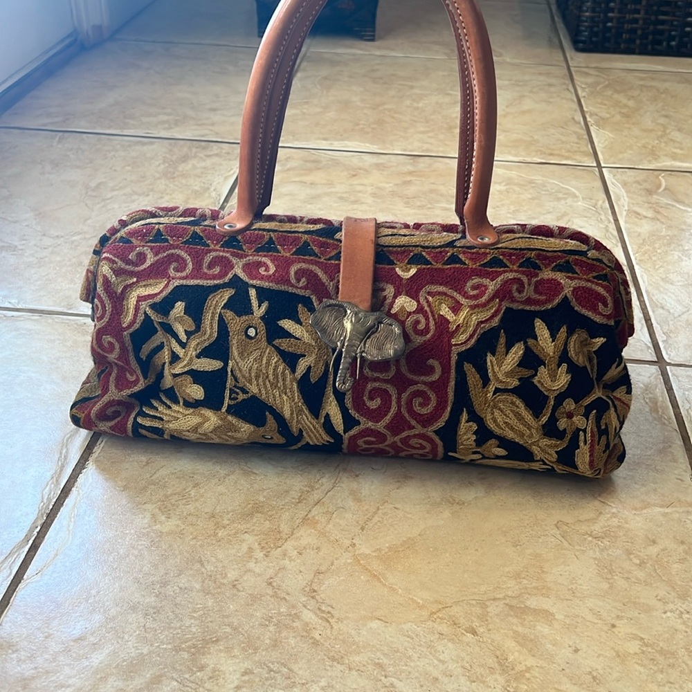 The Elephant Walk carpetbag hand crafted in Dallas Texas.
